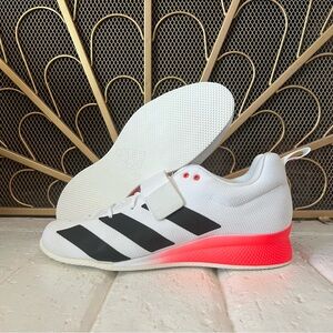 adidas White Training Shoe with Black Stripes and Coral Accent